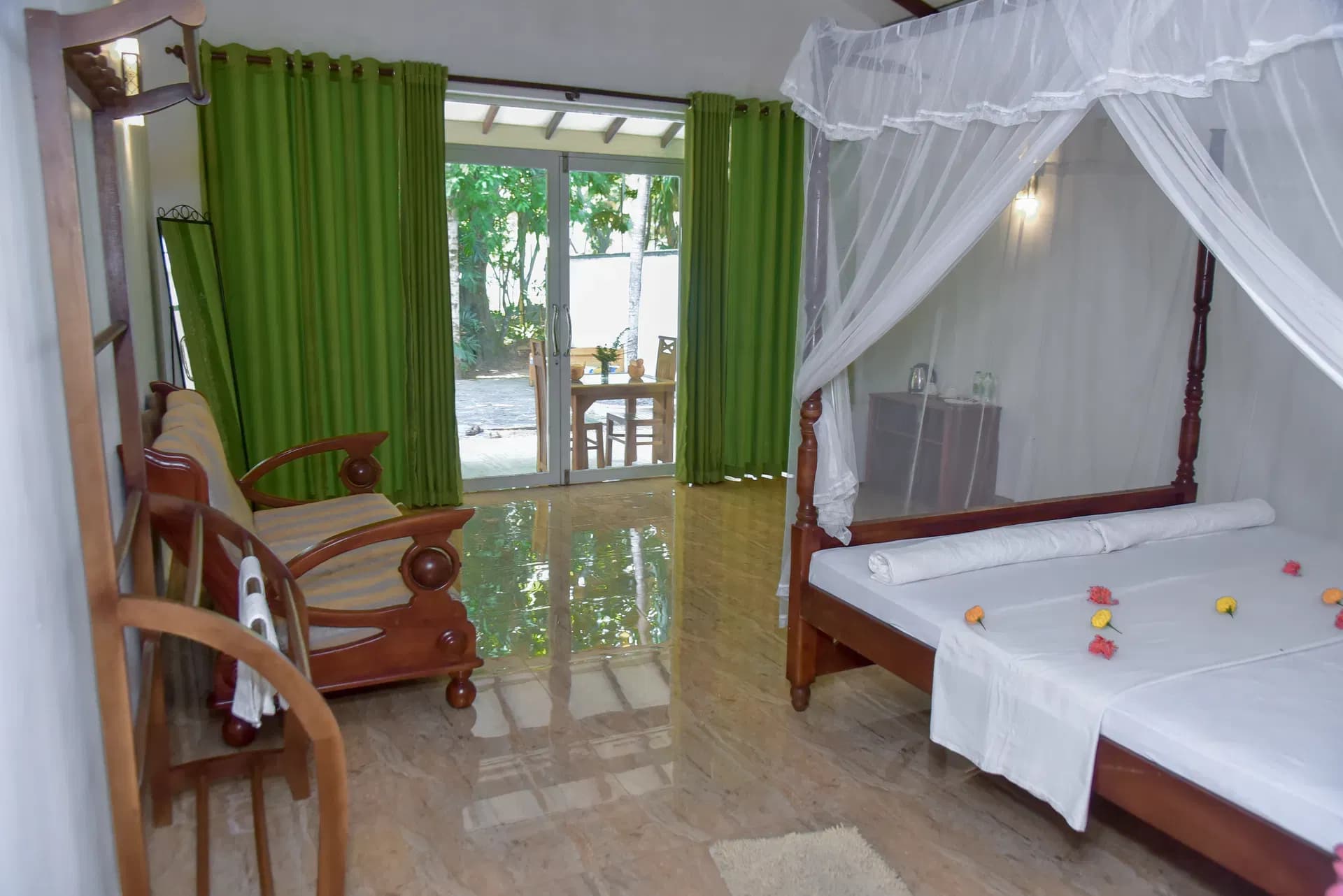 Family room with canopy bed and seating area