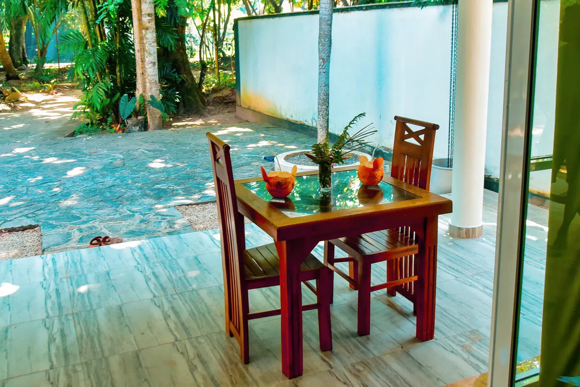 Seating area with tropical plants