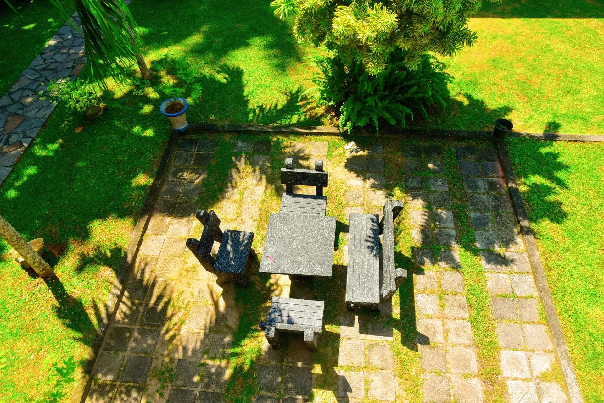 Bungalow seating area surrounded by greenery