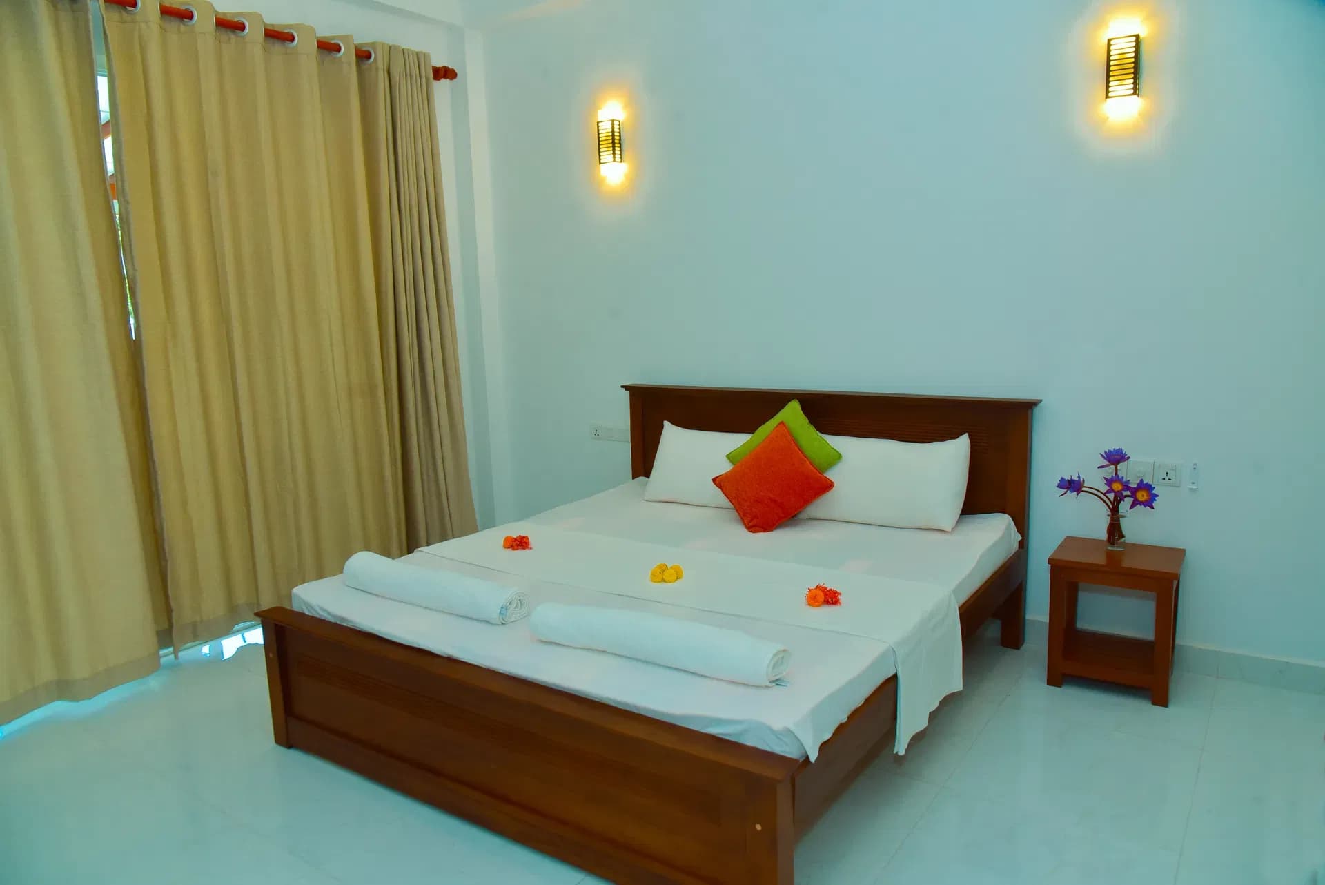 Deluxe room with elegant bed